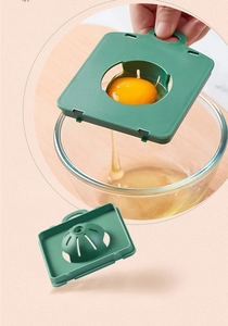 Close-up of green plastic egg separator showing yolk separation in 13-piece kitchen set