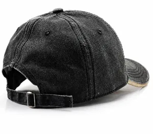 Detail view of the washed grey baseball cap back with adjustable strap and metal buckle