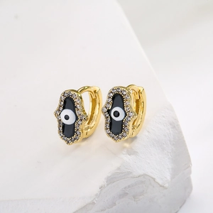 Hamsa Hand earrings in 18K gold plated copper with black enamel and blue evil eye detail
