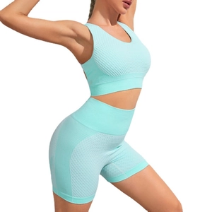 Mint green seamless fitness set featuring honeycomb texture bra and high-waist shorts