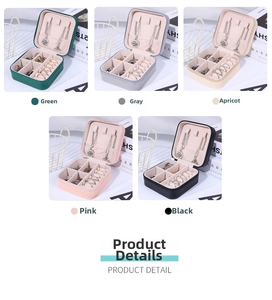 Macro detail of portable square leather jewelry box with multi-color storage slots