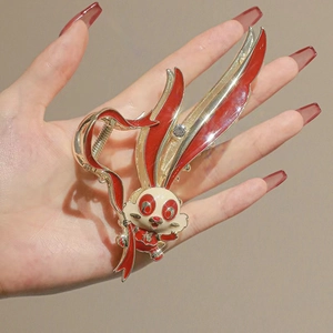 Exquisite rabbit hair claw clip with traditional red fan and floral tassel detail