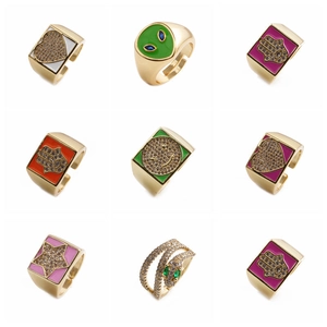 Nine assorted gold open rings with heart, star, and Hamsa hand designs featuring zircon stones