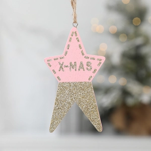 Pink and gold star Christmas tree ornament with X-MAS text on festive bokeh background