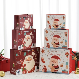 Cartoon Santa and Reindeer Christmas paper gift bags with handles in red and white colors