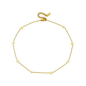 Golden titanium steel necklace with elegant clover and heart charms on white background