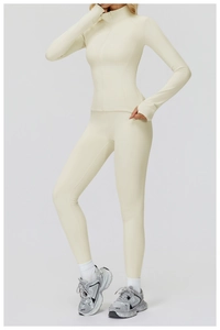 Detail view of cream stand collar sports jacket with thumbhole cuffs and slim fit design