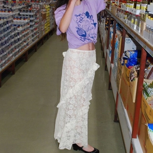 Y2K style white lace maxi skirt with ruffle details and sheer layers for summer fashion