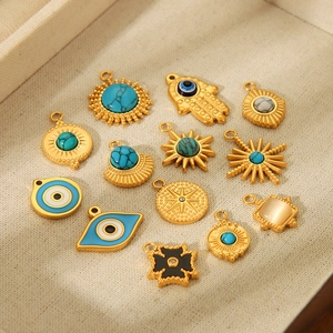 Selection of gold stainless steel pendants with evil eye and turquoise inlays