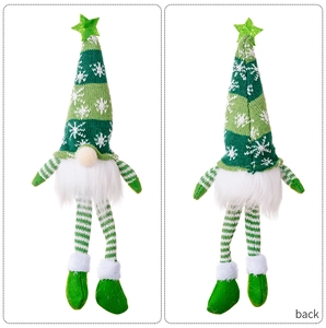 Front and back detail of a green Christmas gnome plush toy with knitted star hat and long legs