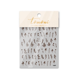 Close-up of brown floral nail art stickers with delicate plant patterns and leaf designs