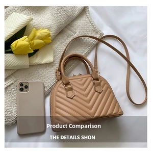 Quilted apricot shell bag with V-shaped chevron stitching and phone size reference