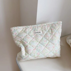 Quilted floral makeup bag with simple wish label in fresh pink and green colors