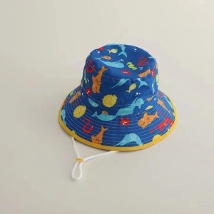 Detail of kids sun hat with colorful sea creatures print and adjustable chin strap