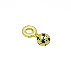Close-up of golden football charm with hollow heart and stripe pattern in 18k gold plating