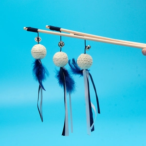 3-piece wooden cat wand set with sisal balls, feathers and bells on a blue background