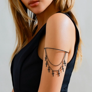 Gothic black arm ring featuring multiple hanging cross pendants and layered chain details
