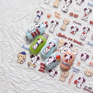 Detail of MC-33 cartoon dog nail art stickers applied on colorful artificial nails