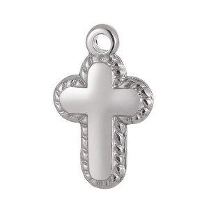 Polished silver stainless steel cross pendant showing metallic luster and texture