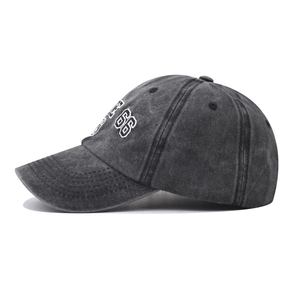 Detailed close-up of charcoal gray washed cotton baseball cap with Route 66 embroidery