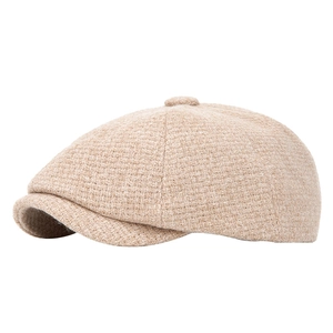 Vintage beige tweed newsboy cap for men featuring premium knitted texture and top button