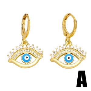 Vintage gold hoop earrings with evil eye design featuring blue and white zircon stones