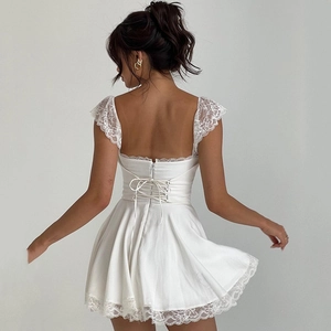 White open back mini dress for women featuring lace trim and lace-up ribbon details