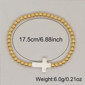 Detail view of gold beaded bracelet with white cross showing size 17.5cm and 6.0g weight