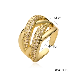 Detail view of gold geometric ring with zircon stones, showing 1.5cm width and 7g weight
