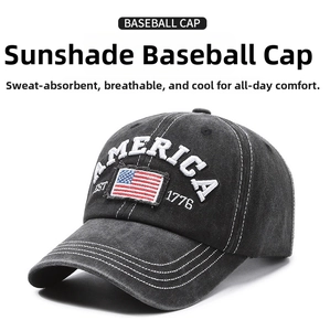 Close-up of vintage black washed canvas baseball cap with America embroidery and flag patch
