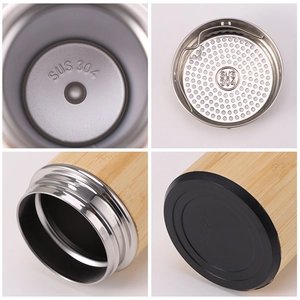 Insulated bamboo coffee mug with SUS 304 stainless steel interior and tea infuser filter