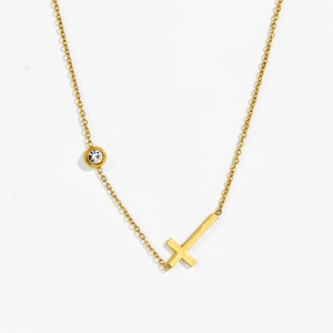 Elegant gold titanium steel necklace with cross pendant and crystal charm on white background
