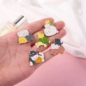 Set of five cute enamel animal pins featuring colorful cats and a turtle with duckling