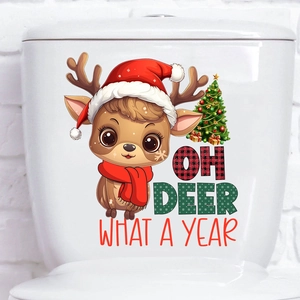 Close-up of waterproof Christmas reindeer wall sticker on white toilet tank with text