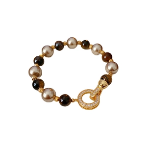 Vintage beaded bracelet with champagne pearls, brown tiger eye stones and gold ring clasp