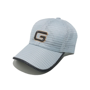 Detail of light blue mesh baseball cap with embroidered G logo and black brim piping