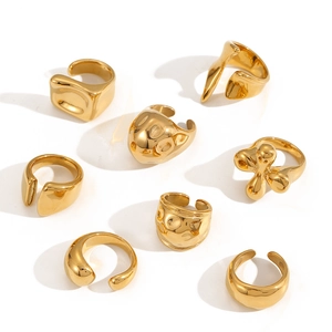 Abstract fluid 18k gold plated stainless steel rings in minimalist modern designs