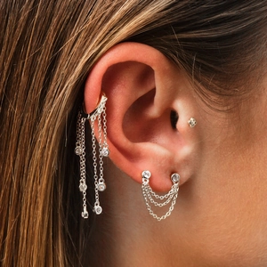 Close-up of S925 sterling silver star tassel ear cuff and chain earring with cubic zirconia