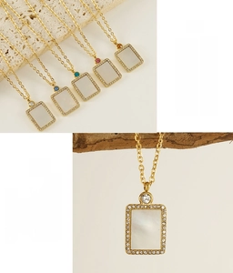 Detailed close-up of a stainless steel rectangular shell pendant necklace with zircon inlay