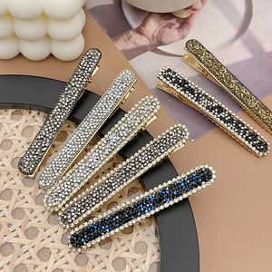 Sparkling rhinestone metal hair clips in various colors with elegant minimalist design
