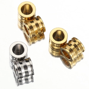 Polished gold and silver stainless steel spacer beads with grooved cylindrical design