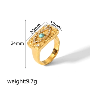 Detail view of 18K gold stainless steel ring with turquoise evil eye and size 24x20x12mm