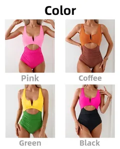 Detail view of four color-blocking one-piece swimsuits with cutout and V-neck designs