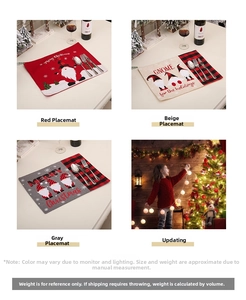 Detailed view of Christmas placemats with gnome embroidery and red plaid patterns