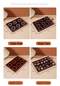 Walnut wood grain jewelry display tray with velvet slots for rings and watches