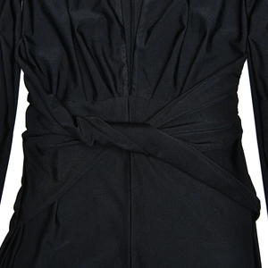 Detailed close-up of the waist knot design and ruched texture on a black deep V-neck bodysuit