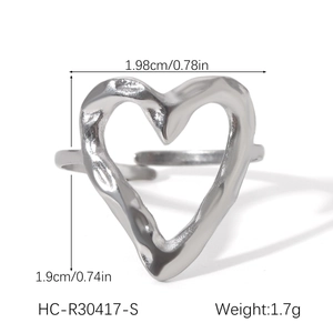 Detailed view of silver heart ring with molten texture and precise size measurements