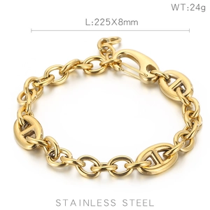 Detail of 225x8mm gold Cuban link bracelet showing stainless steel texture and size specs