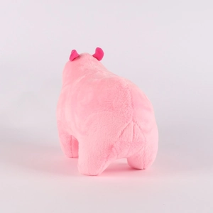 Rear view of pink plush Capybara toy showing soft texture and small ears on white backdrop