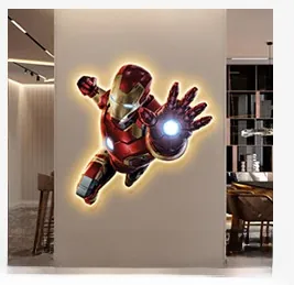 Detail of Iron Man LED wall art showing yellow backlight and superhero flying silhouette